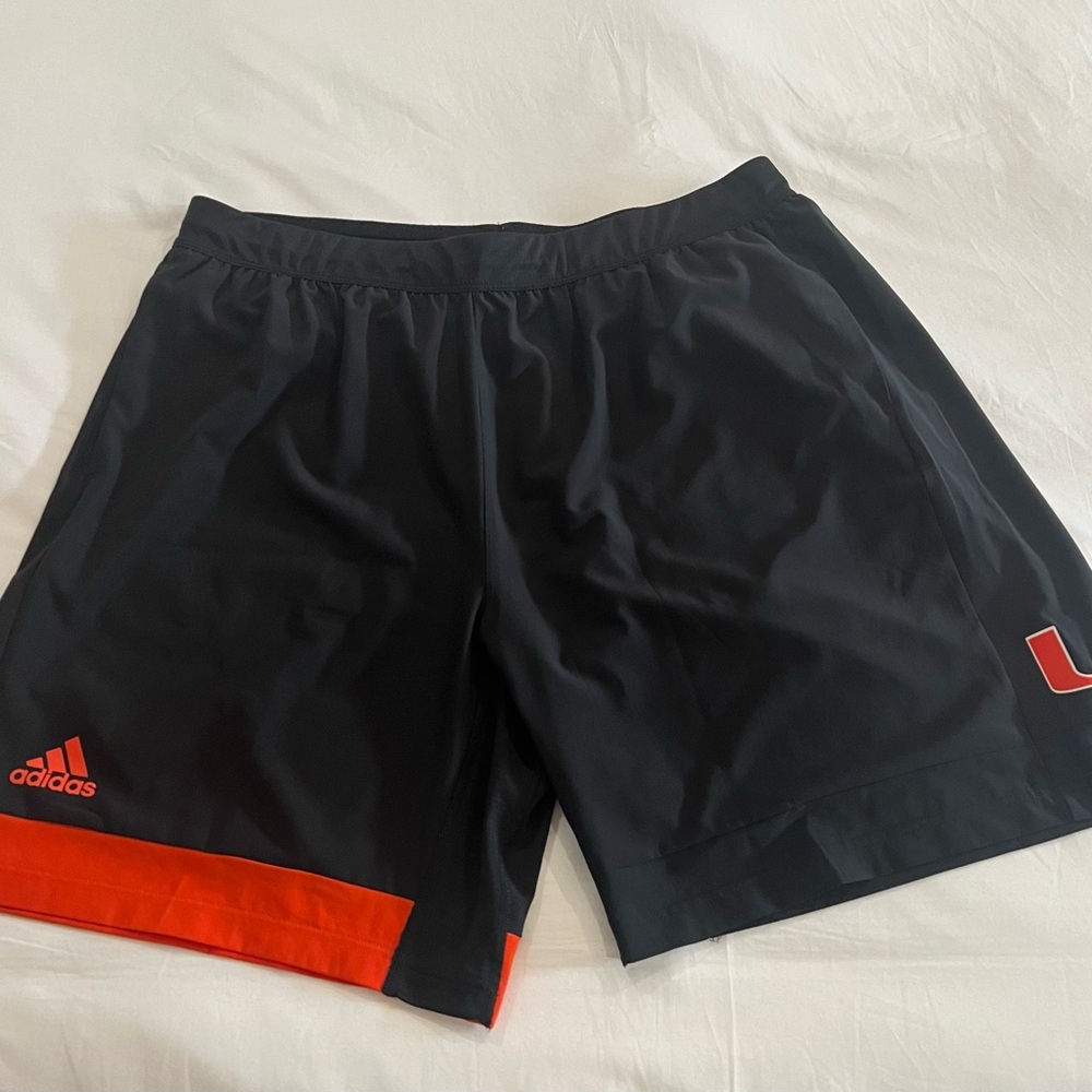 Men’s black adidas shorts.